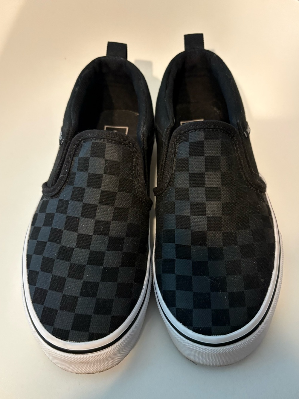 Vans Kids Black Checkerboard Slip-On Sneakers